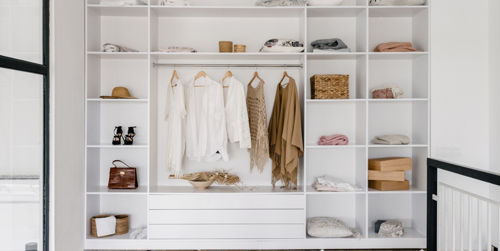 Front view of modern and large wardrobe in dressing room